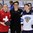 MALMO, SWEDEN - APRIL 1: Erika Holst presents the Player of the Game awards to Switzerland's Julia Marty #6 and Finland's Michelle Karvinen #21 after quarterfinal round action at the 2015 IIHF Ice Hockey Women's World Championship. (Photo by Andre Ringuette/HHOF-IIHF Images)

